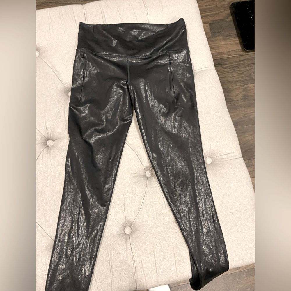 Athleta shiny black salutation leggings Medium Tall